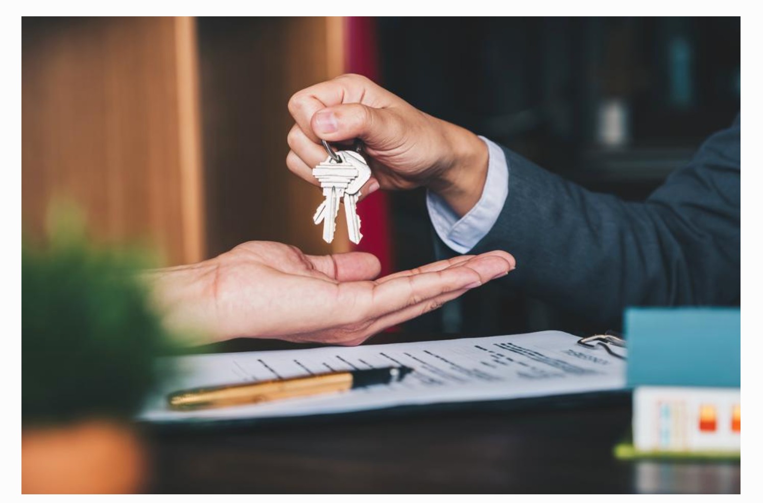 Entrepreneur reviewing acquisition opportunities with an advisor